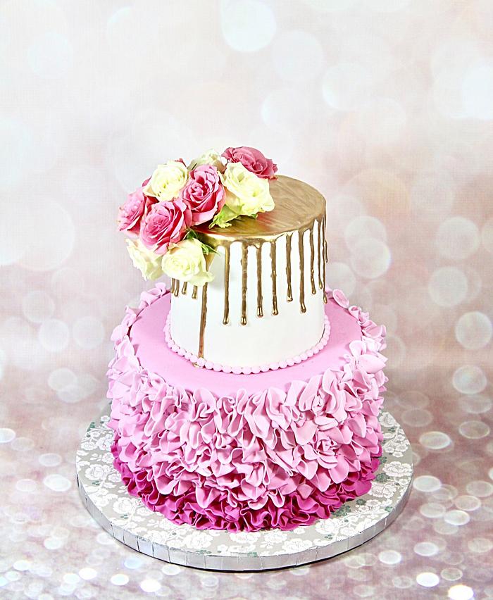 Pink Ombré and gold drip cake 