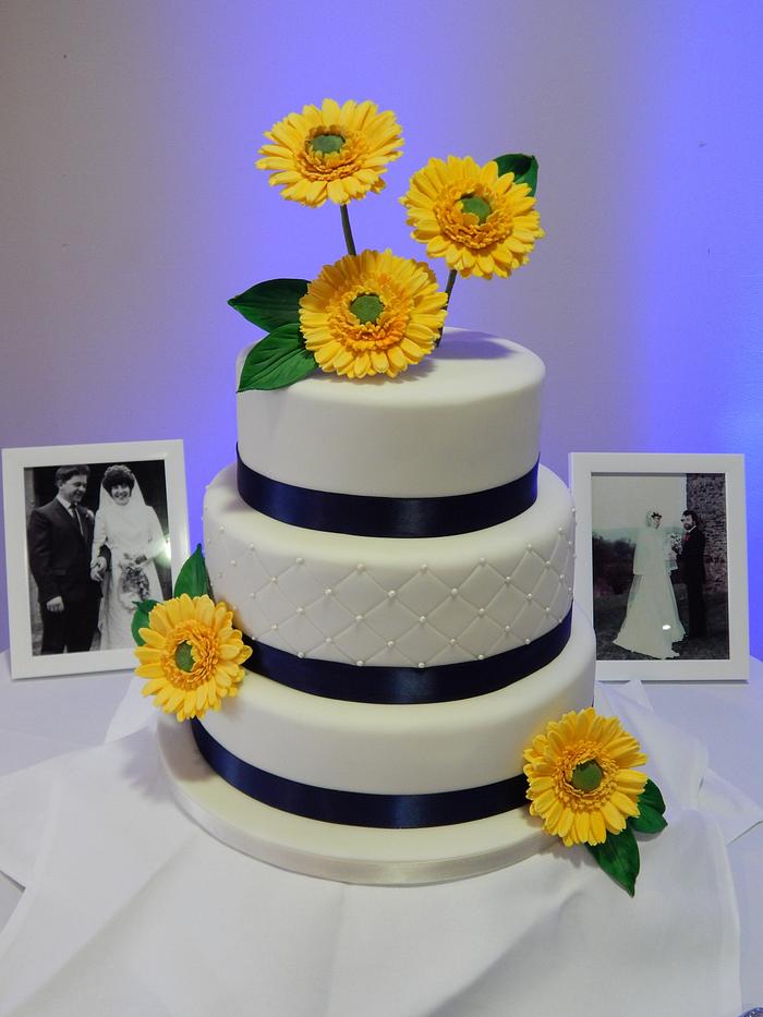 Gerbera and Navy wedding cake.