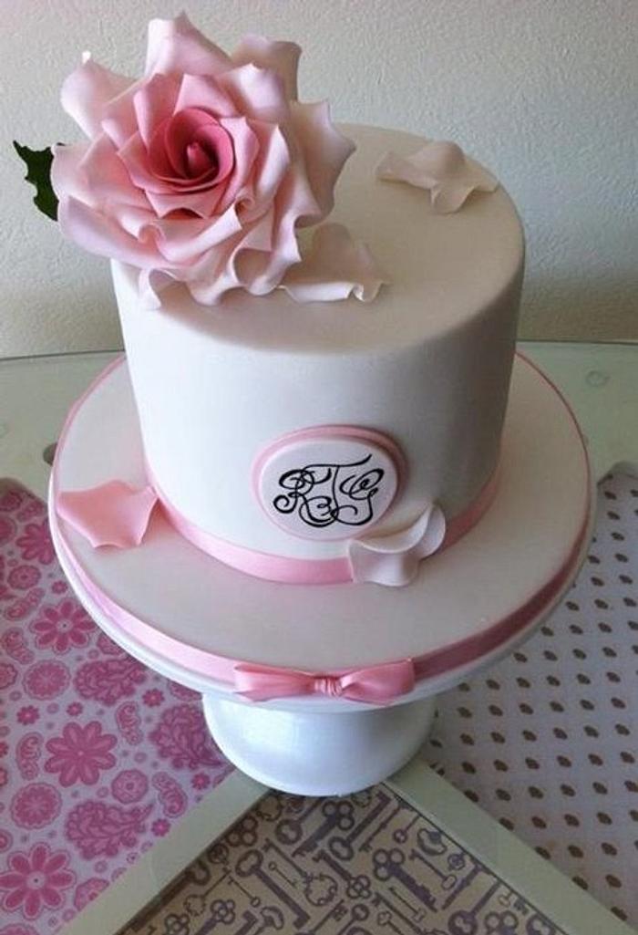 Simple pink & white small wedding reception couples cake