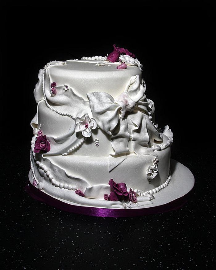 Dazzlelicious Bow, fabric and flowered wedding cake