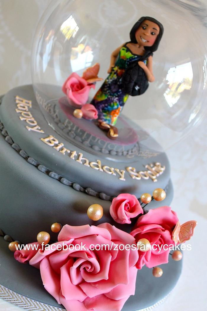 Glass ball cake with figure 
