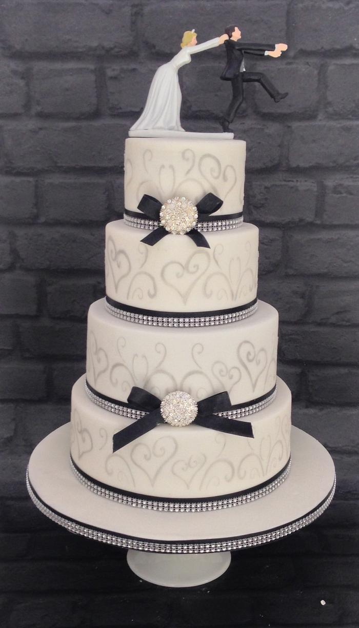 Black,white and silver stenciled wedding cake 