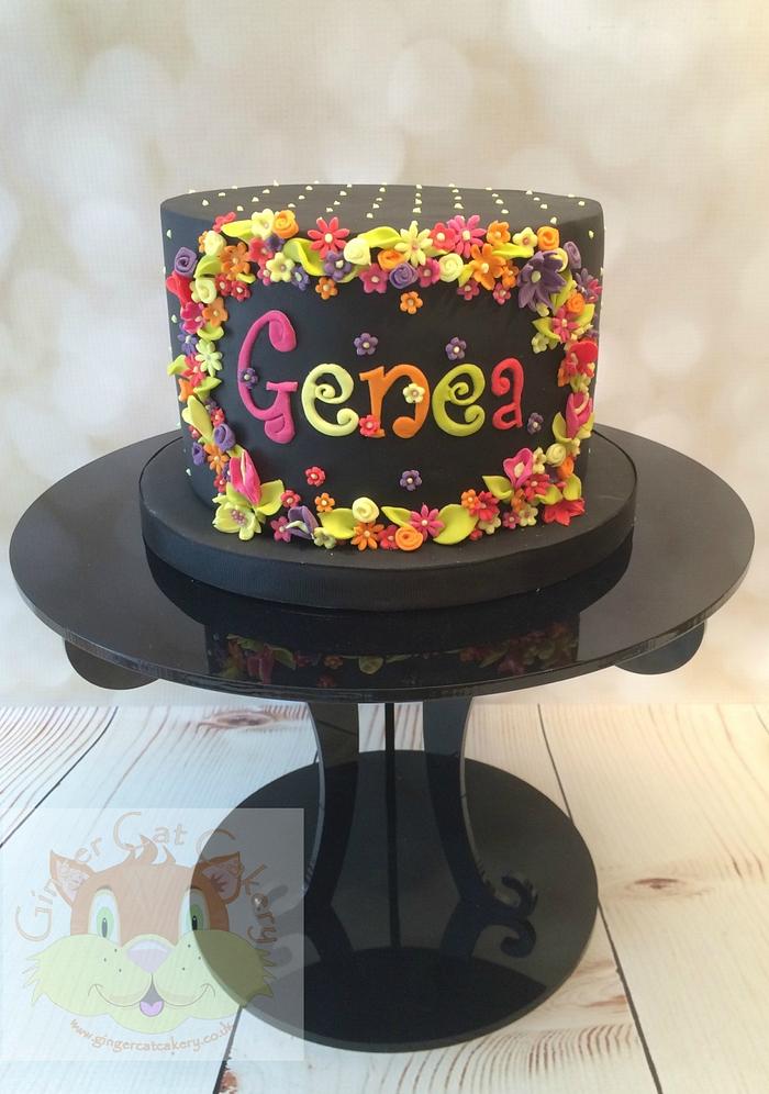 Black cake with flowers