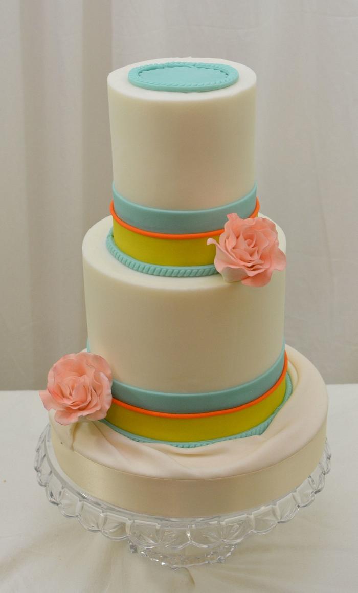 Simple Cake with Teal,  Yellow and Orange Bands