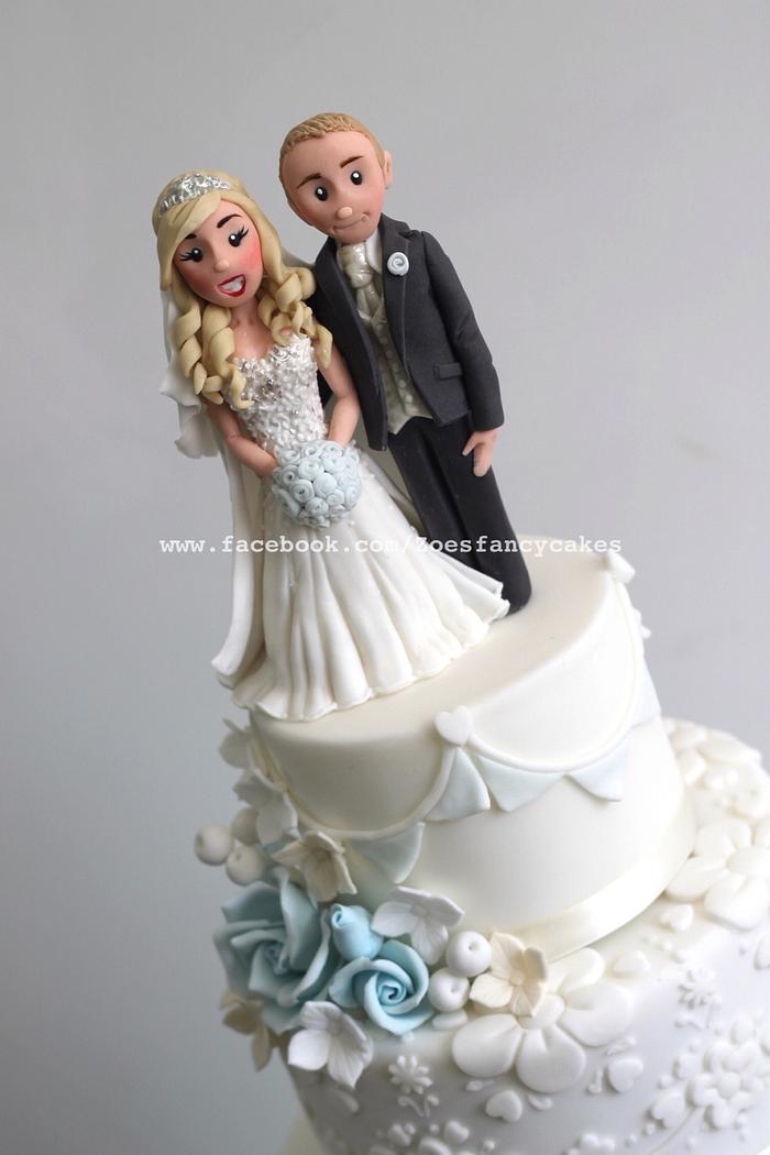 Wedding cake with blue rose details