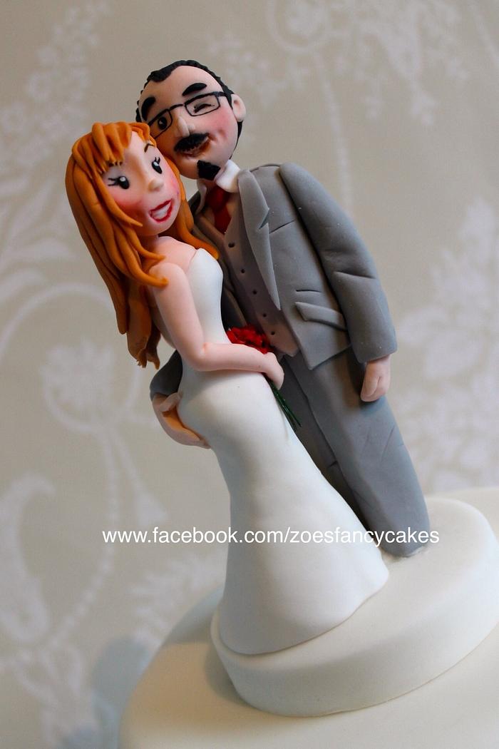 Cheeky bride and groom cake topper