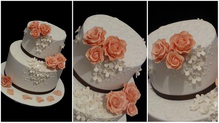 Wedding cake with roses and swirls