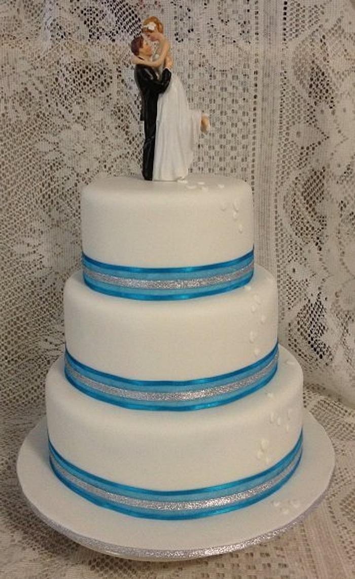 Blue & silver ribboned wedding cake