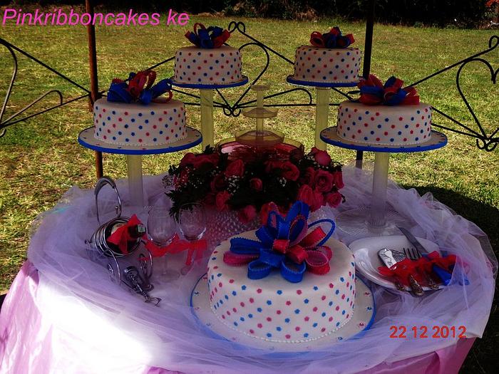 pink and blue polka dots wedding cake