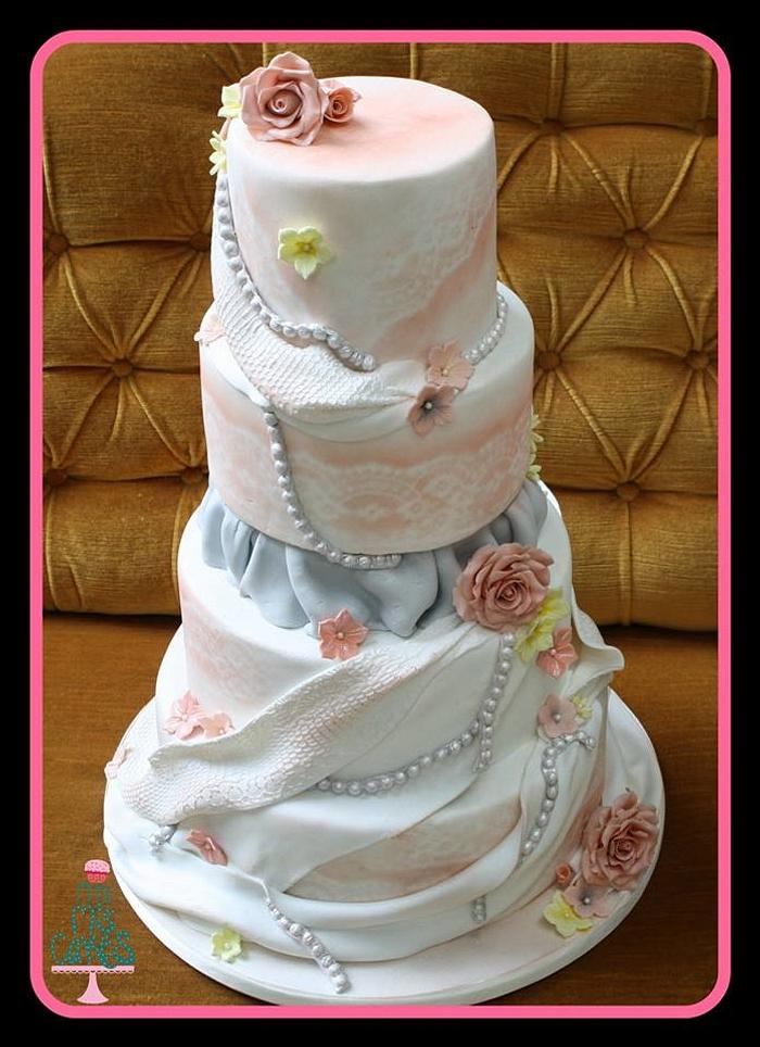 Dusky pink and lace cake