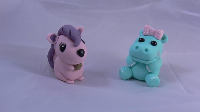Baby squirrel and baby hippo cake toppers