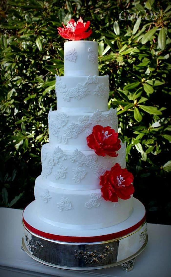 lace and ruby red peony wedding cake 