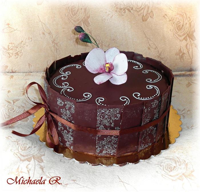 Simply chocolate cake with orchid
