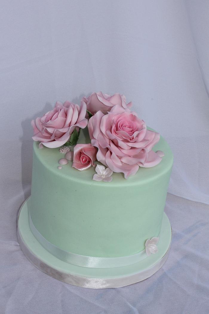 Pink Roses on a Mint green cake.