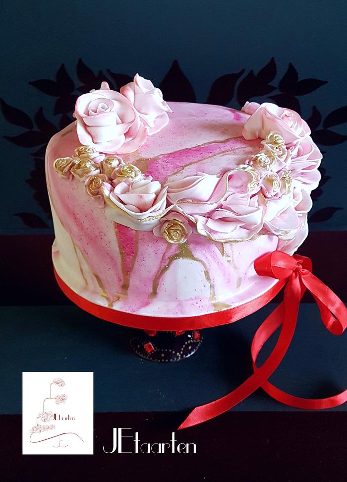 Pink marbled and roses birthday cake