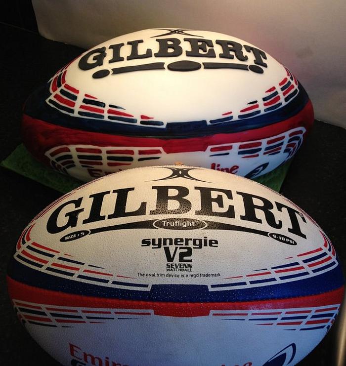 Hand painted rugby ball cake