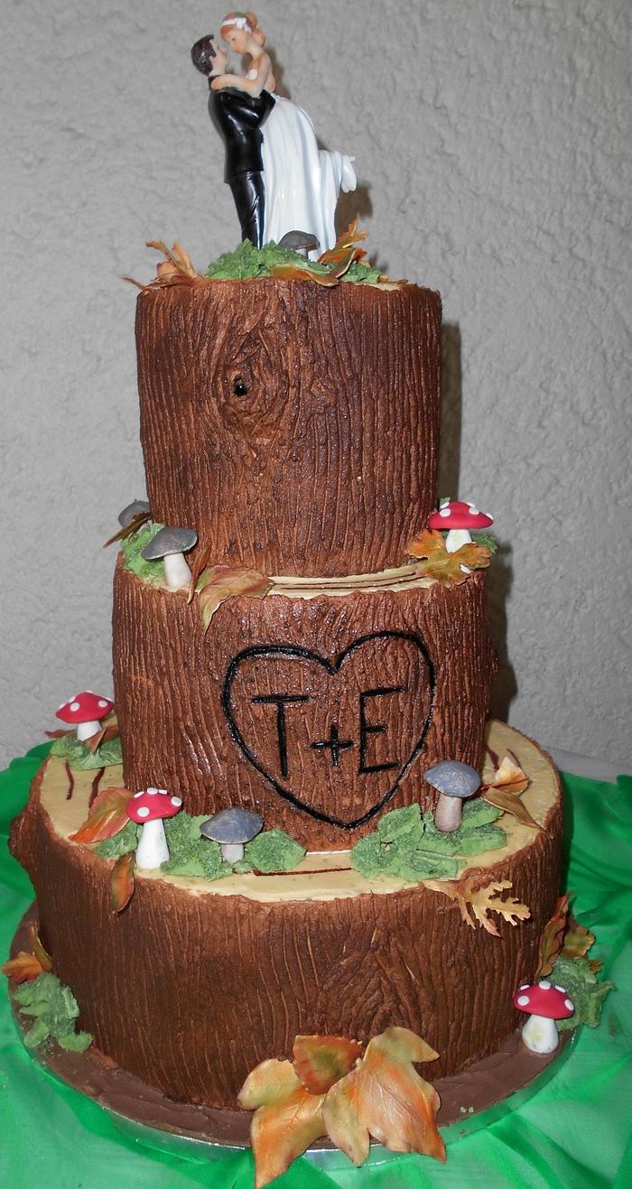 Tree trunk themed wedding cake