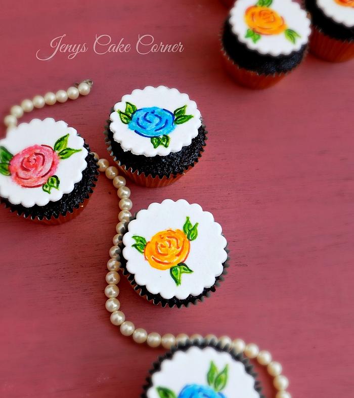 Hand-painted floral cupcakes