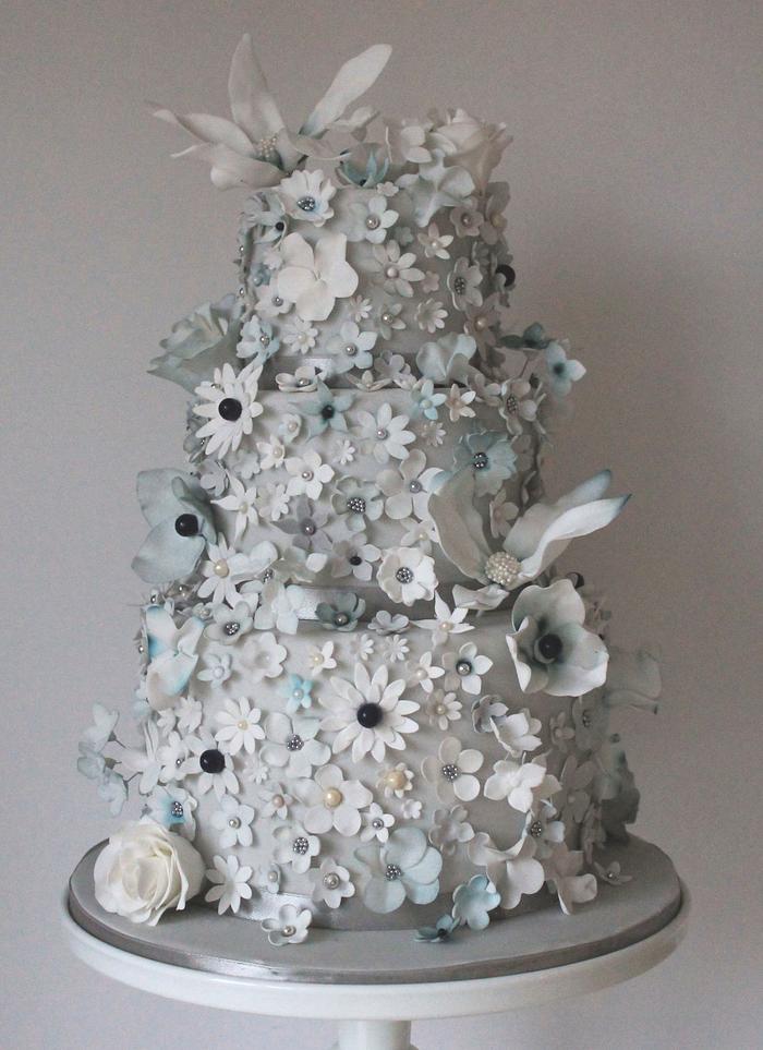 Pale grey, silver and midnight blue frivolous flower wedding