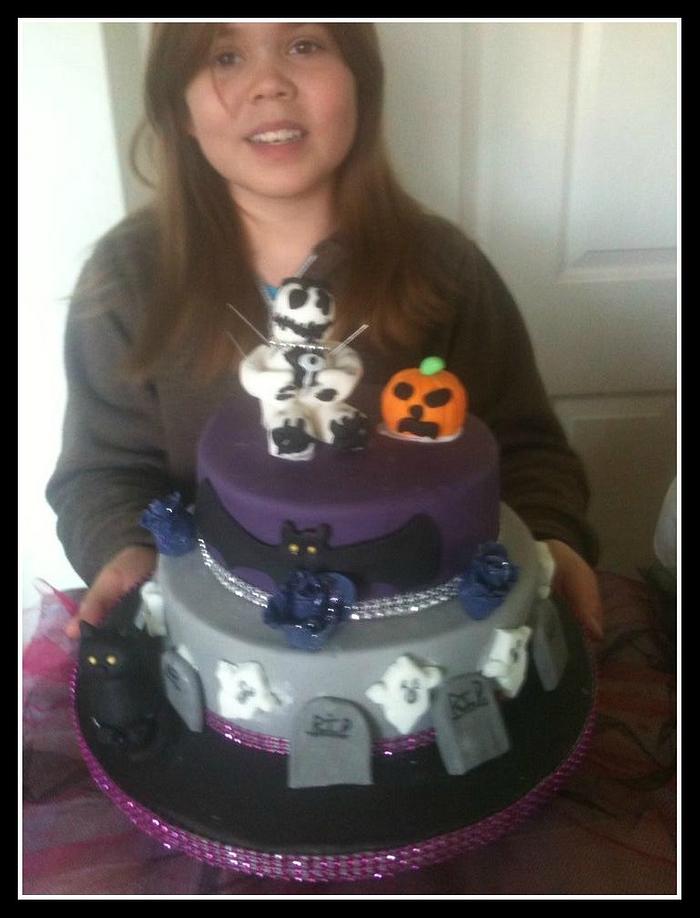 My 10yr old daughter makes Halloween cake.