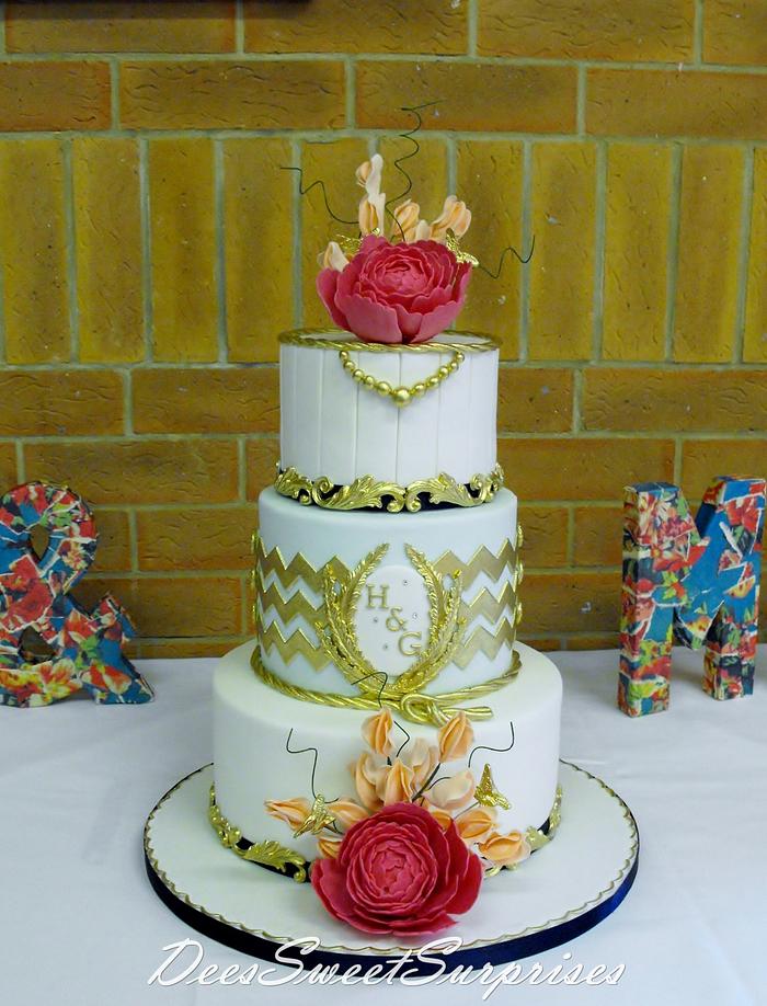 3 tier chevron and peony wedding cake