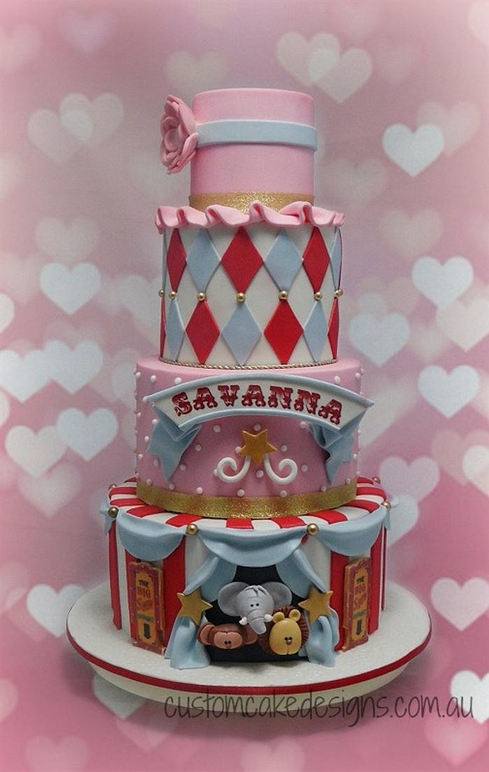 Cocoatease - “Getting lost in the carnival today.”🎡🎪🤡A 3 tier, assorted  chocolate flavoured, carnival themed birthday cake. . . . . . #carnival # theme #carnivalcake #clown #circus #ferriswheel #carousel #popcorn #hotdog  #balloons #