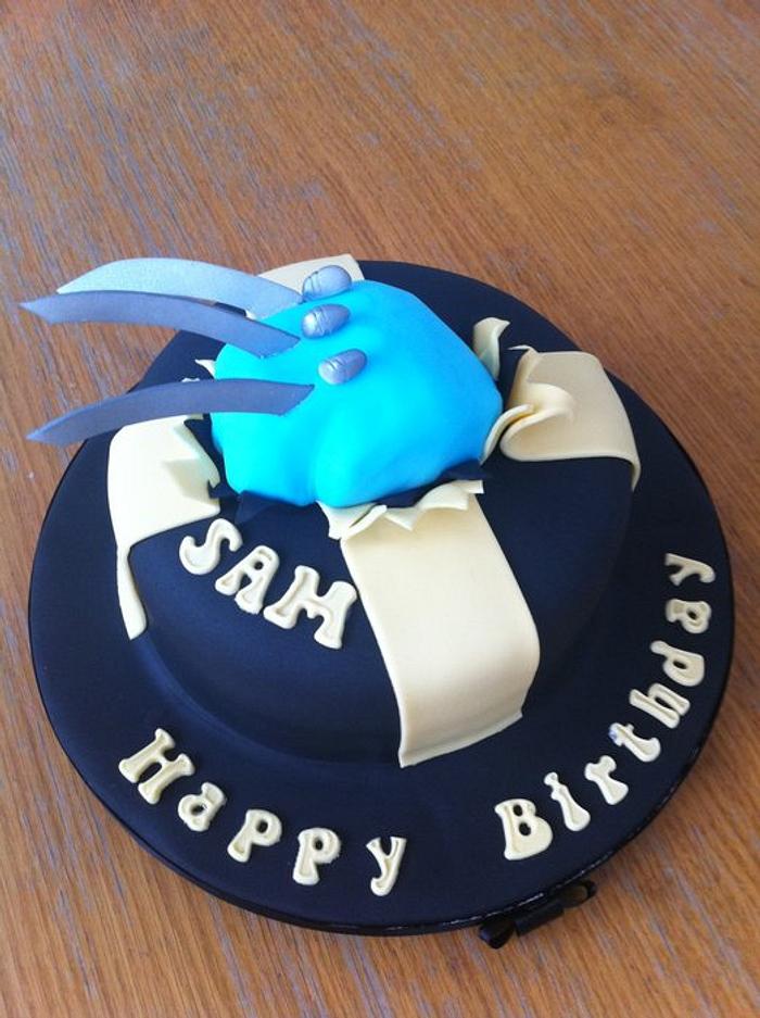 wolverine fist with claws out of cake