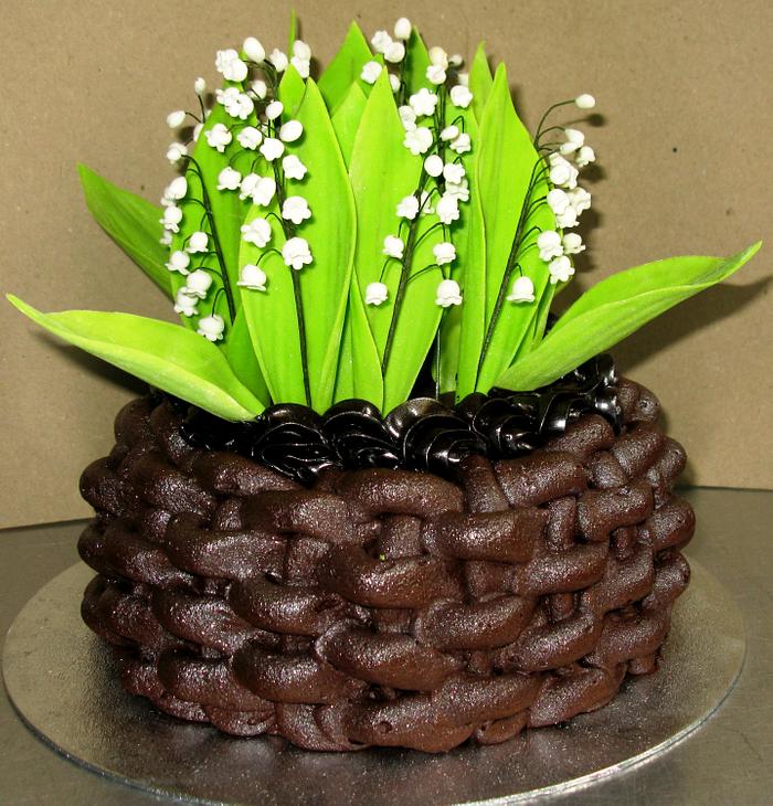 Basket with lily of the valley