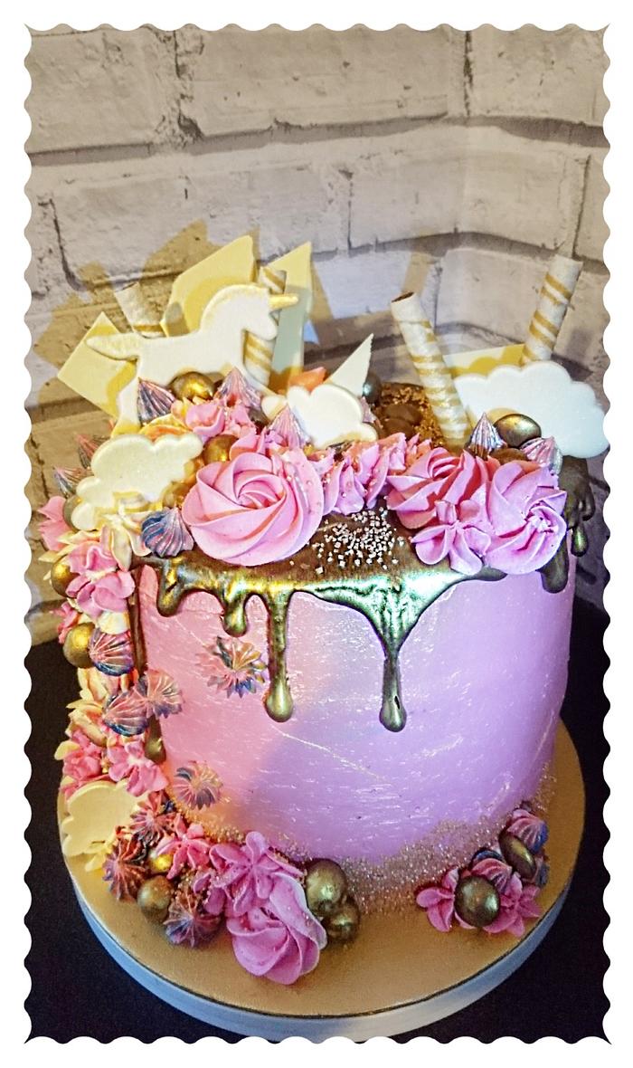 Rose gold unicorn drip cake