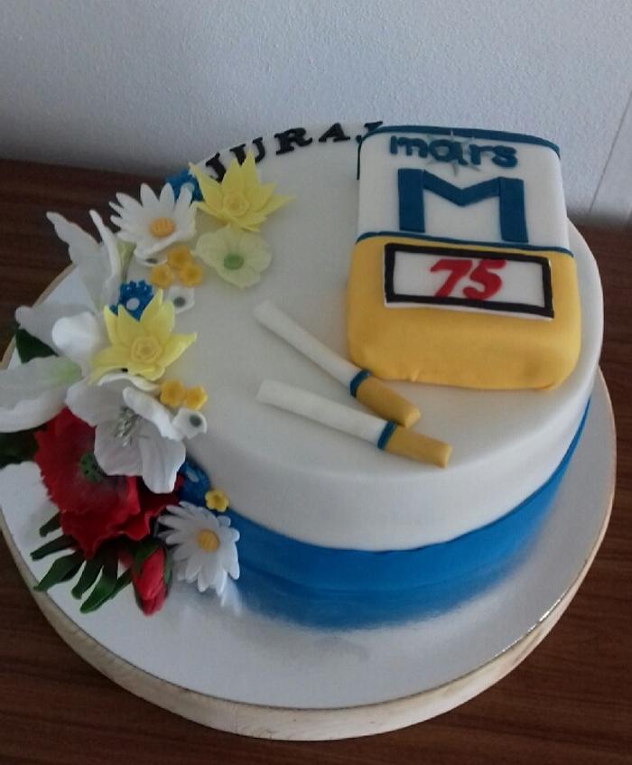 Cake with box of cigarettes