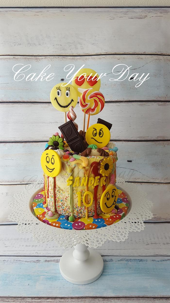 Emoji Cake with lots of sweets.