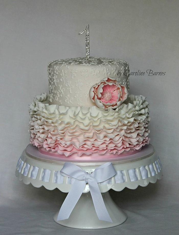 Pink ruffled 1st birthday cake