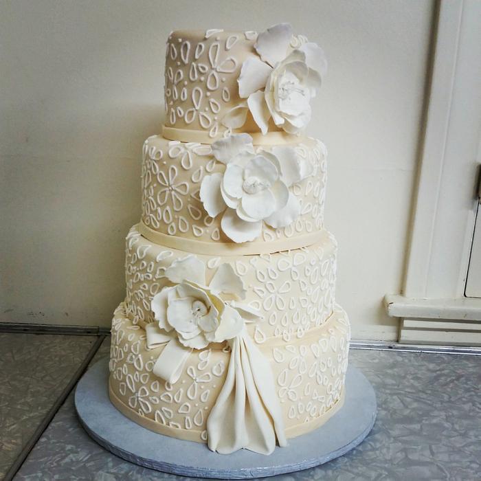flowers and lace wedding cake