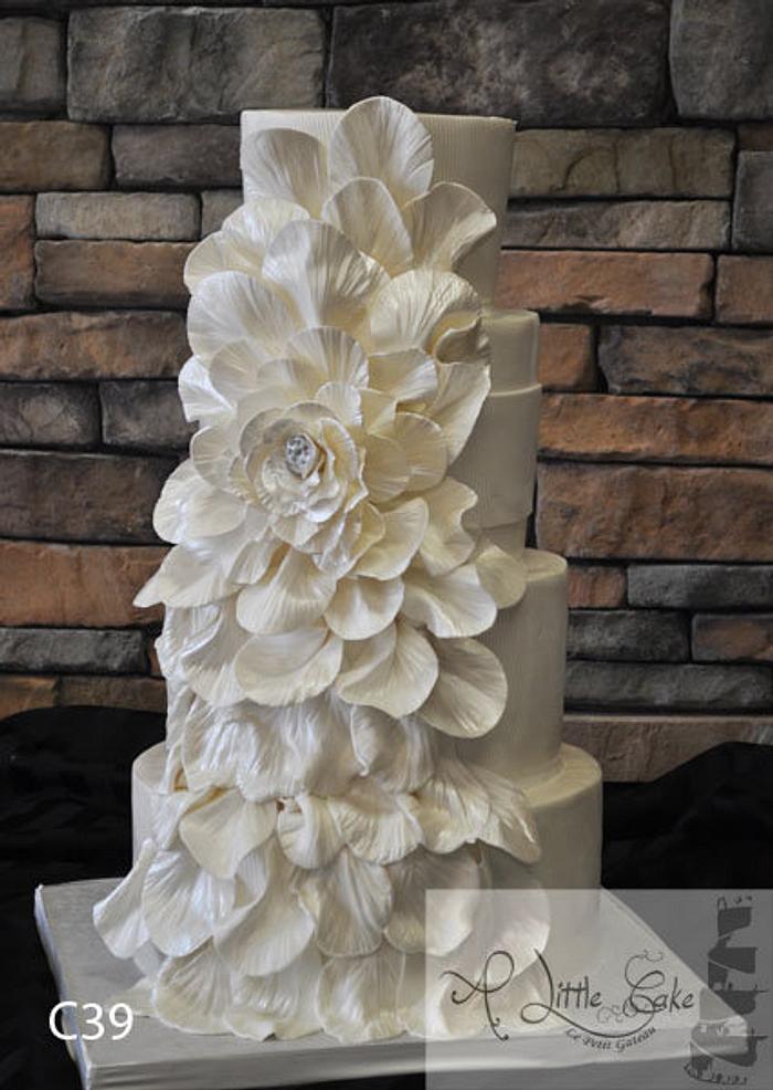 Fondant Wedding Cake With An Overflowing Flower