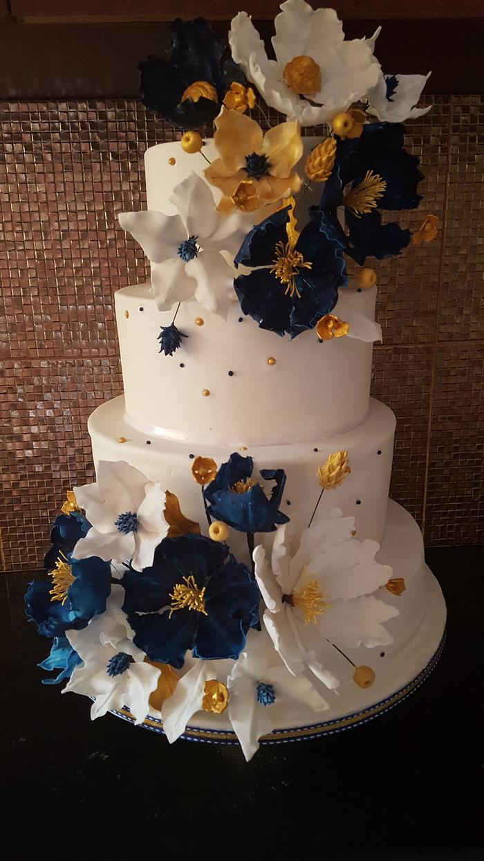 Navy blue and gold wedding cake