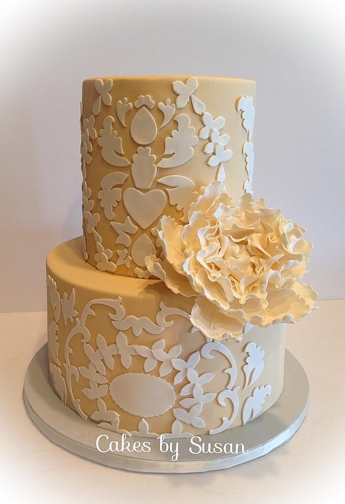 vintage cream colored wedding cake