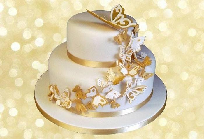Golden butterfly wedding cake