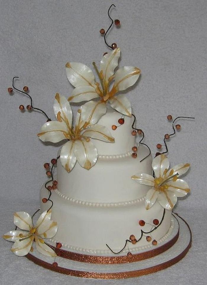 Stargazer lilies wedding cake