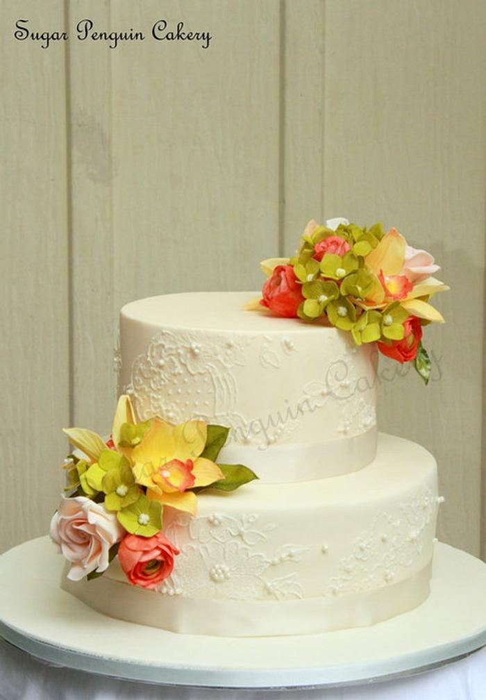 Exotic orchids and coral wedding cake