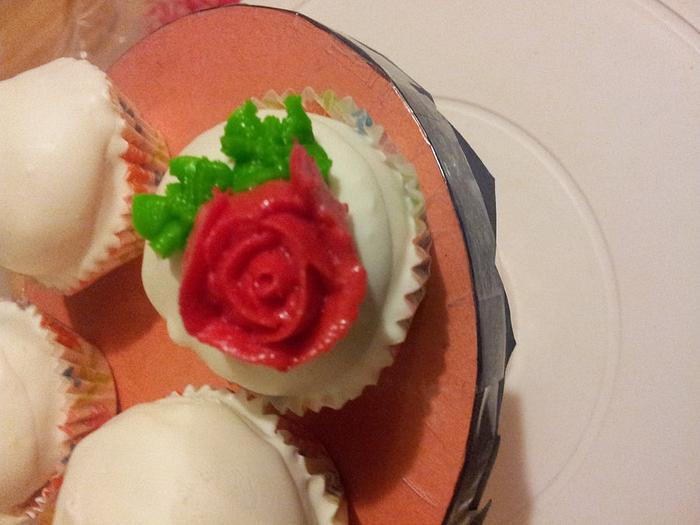 buttercream rose on a cake ball