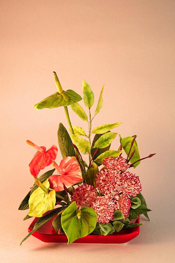 Arrangement of flowers anthurium and carnations