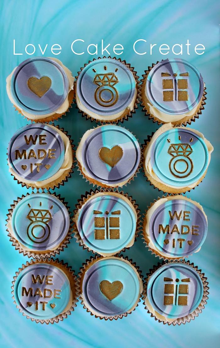 Engagement Cupcakes with Grey and Turquoise marbled fondant and gold detailing