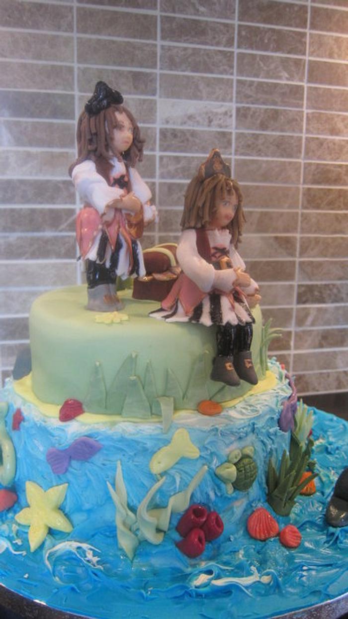 Pirate cake for twin girls - caricatures of the twins
