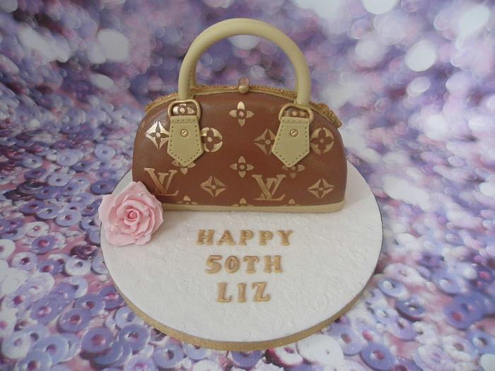 Louis Vuitton handbag cake.