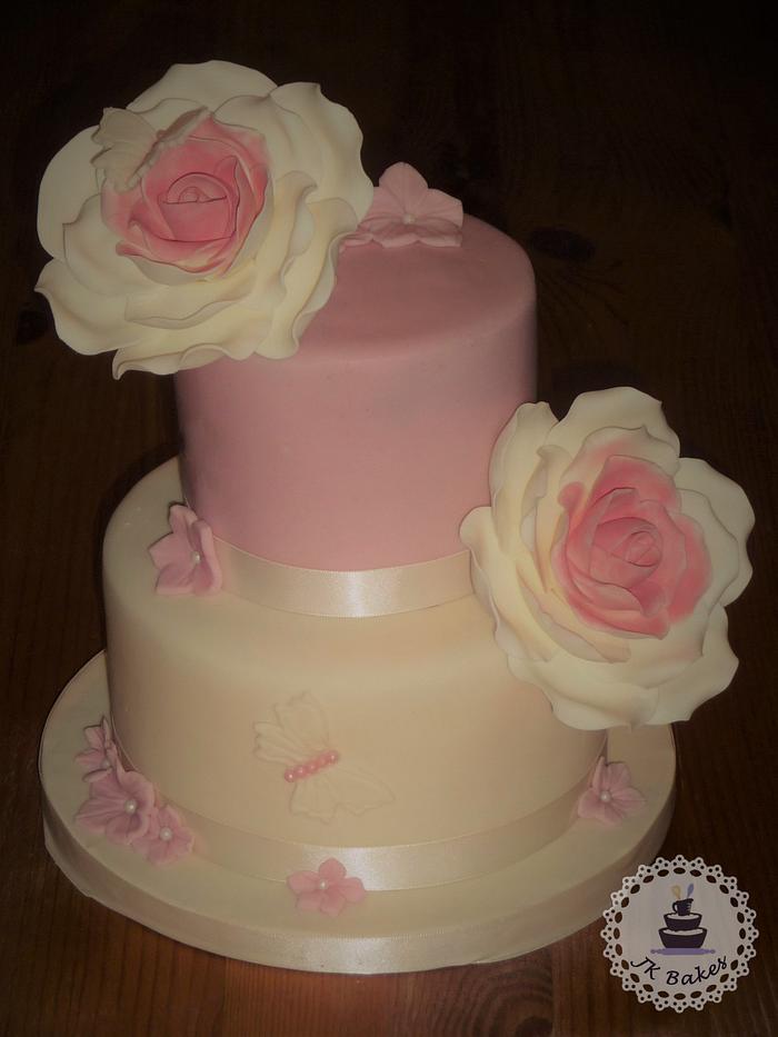 ivory and pink rose wedding cake