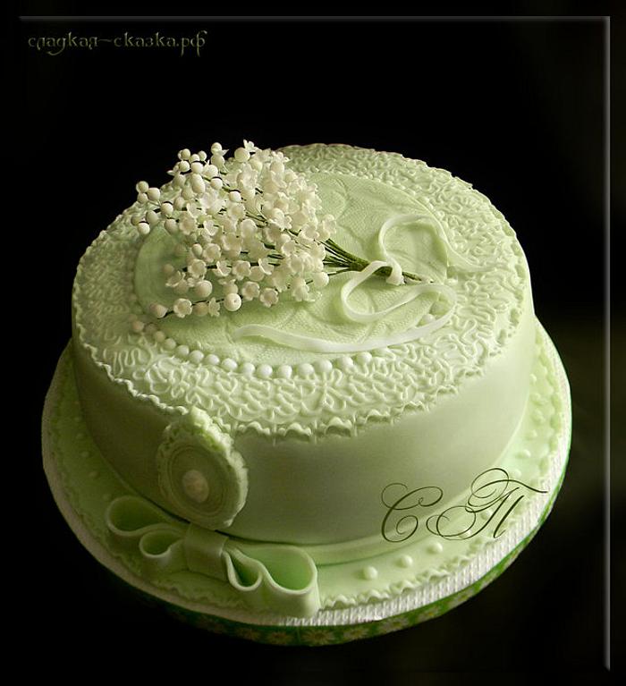 Cake with lilies of the valley