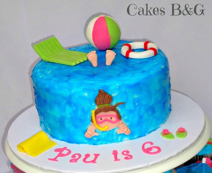 Swimming pool themed cake and cupcakes
