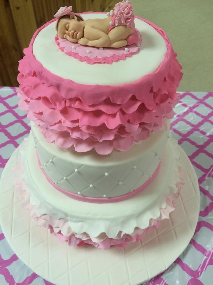 Pink ruffled baby shower cake