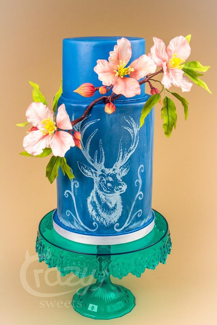 Design cake with Clematis and deer