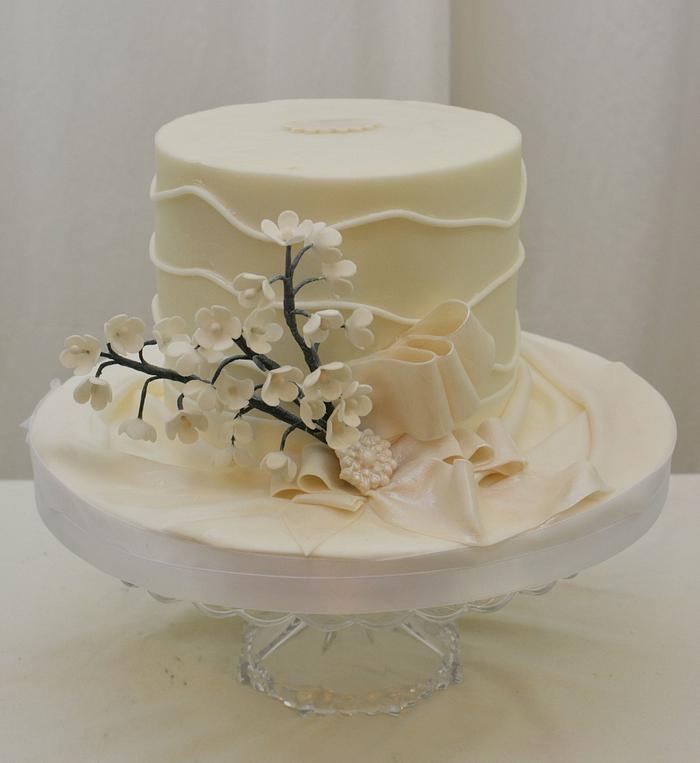 White Cake with Little Flowers and Bow